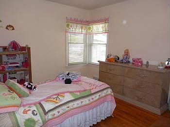 Bedroom 2 offers hardwood floor