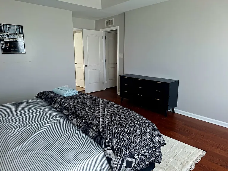 Relax in a thoughtfully furnished guest bedroom designed to provide comfort throughout longer stays.
