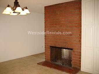Double fireplace, dining area and living room