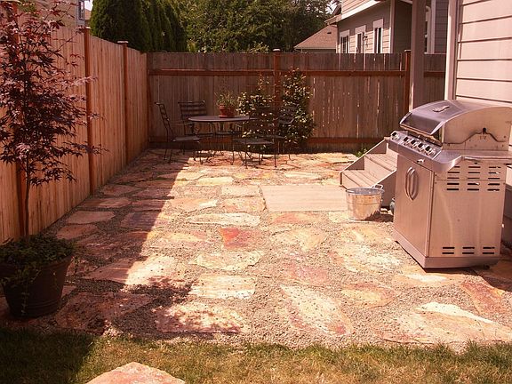 Patio and large, level yard