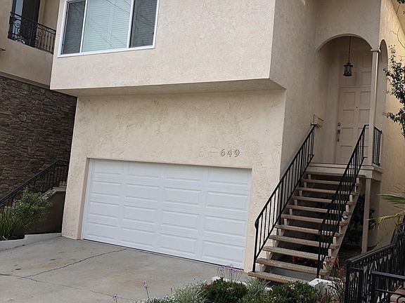 Ocean view window, 2 car garage, 2 spaces in driveway