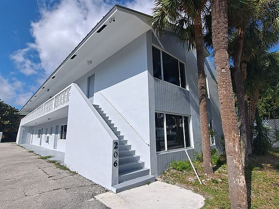 First door top of the stairs
In rear.