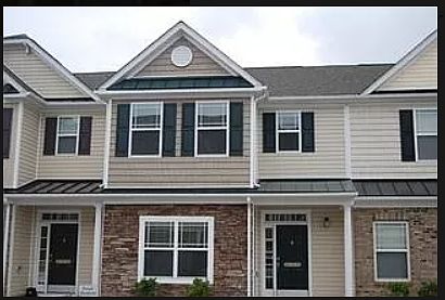 Front of the property. There are two reserved parking spaces for the tenants.