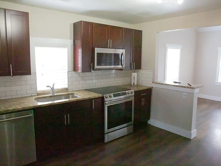 Kitchen leading into the living room.