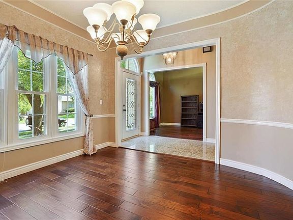 Formal Dining Room upon entering the house with beautiful hardwood floors.