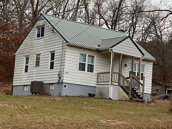 Front of house- first home on driveway to family farm- snow will be plowed.