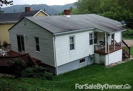 Side View
						:
						Large private deck w/sliding glass door entrance. Covered side porch w/swing