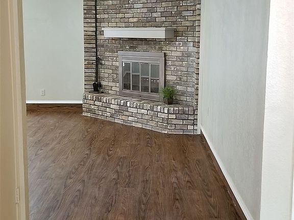 Pergo floors in entry way. Updated floors in living.