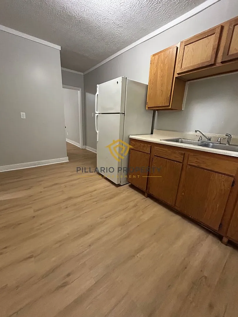 3943-3945 Cornelius Ave — Photo 4