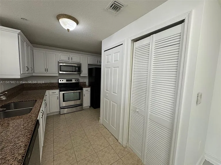 5271 SW 8th St — Photo 7