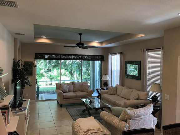 Living/ Family Room with tray ceiling.