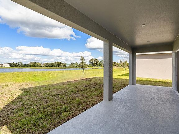 Your interior opens to outdoor living space on an oversized covered lanai.