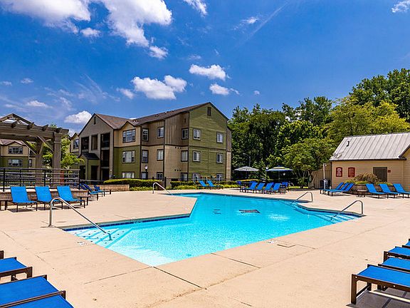 Relax by the Sparkling Pool with Lounge Chairs