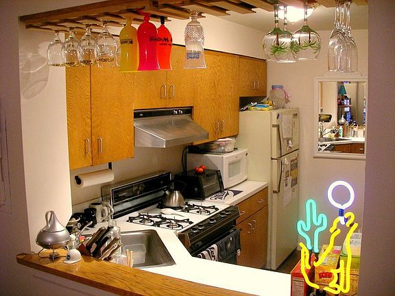 Kitchen opening into din. area