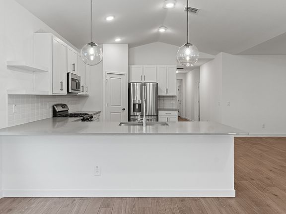 Kitchen with pendant lighting
