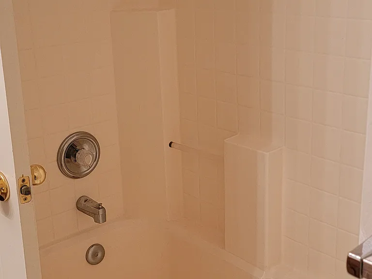 Hallway shower in tub (same bathroom as previous photo)