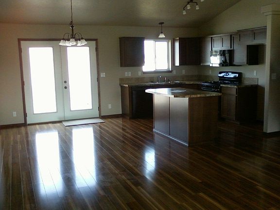 Open Concept living/dining/kitchen. Garden doors.