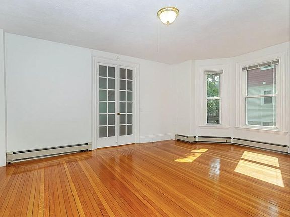 Living Room with French Doors to Back Bedroom