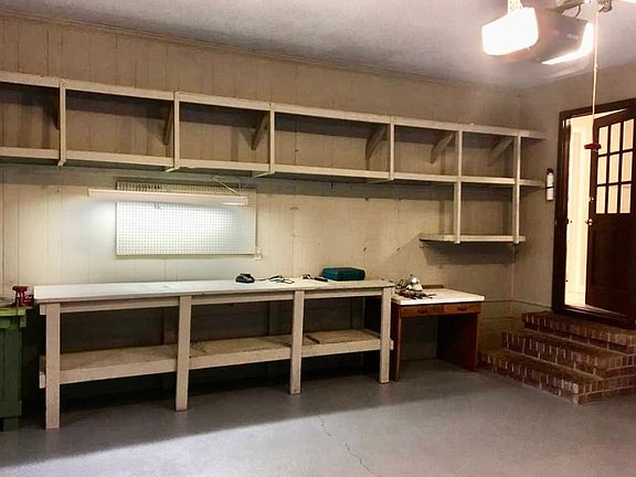 2 car garage with shelving