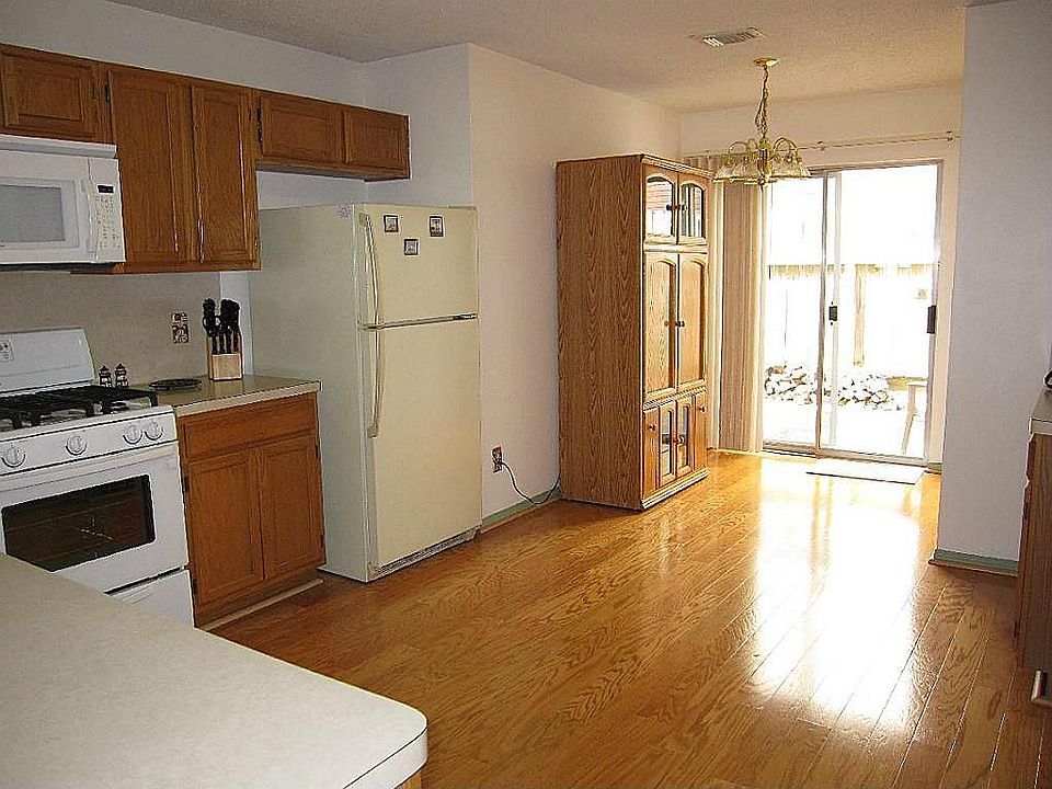 Spacious kitchen with wood floors