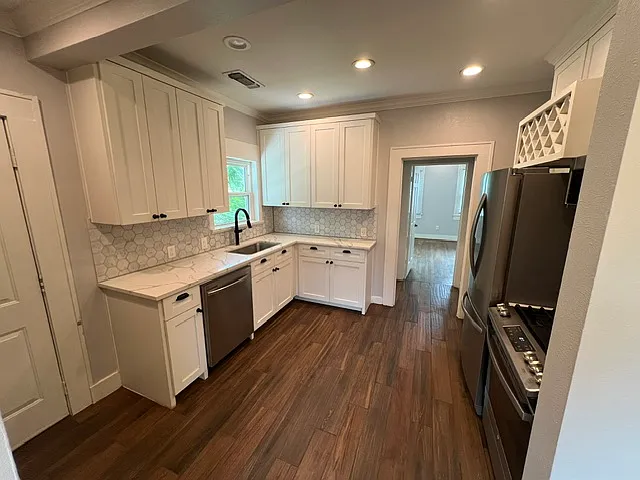 Custom Kitchen, Marble, Granite, Stainless appliances, Wine rack