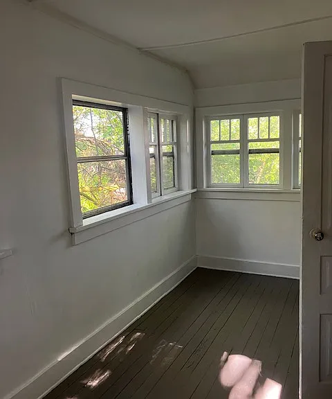 Rear sunroom with southern, passive solar exposure