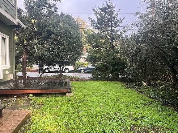 View 2 - Side yard with 2 decks