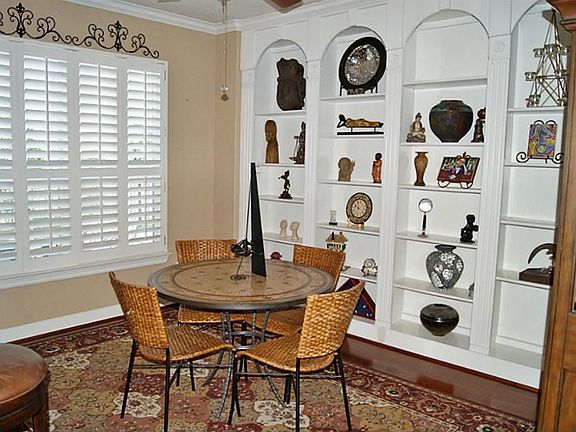WOOD FLOORS, FRENCH DOORS, & BUILT-INS IN STUDY