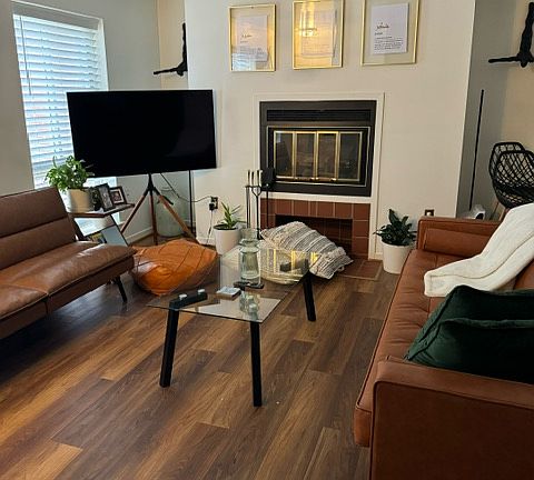 Bright Living Room New Flooring Throughout entire Condo!