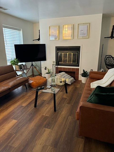 Bright Living Room New Flooring Throughout entire Condo!