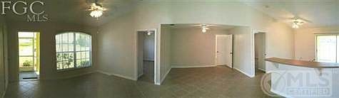 Panoramic Great Room. Entrance, living room, den and kitchen.