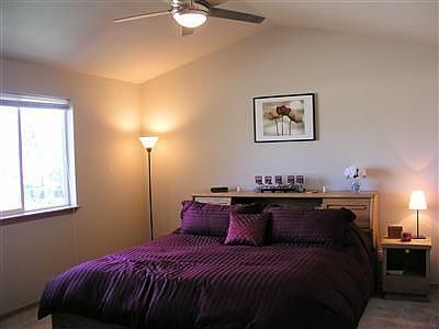 Elegant Master Bedroom has vaulted ceiling, ceiling fan, private master bath, 