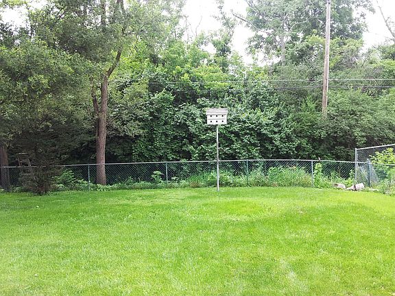 Backs to woods & stream