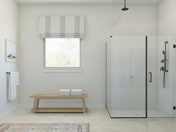 Primary bath with glass shower enclosure