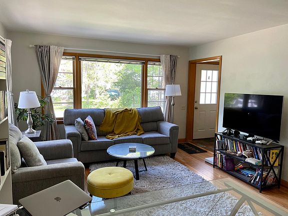 Large living room with hardwood floors.