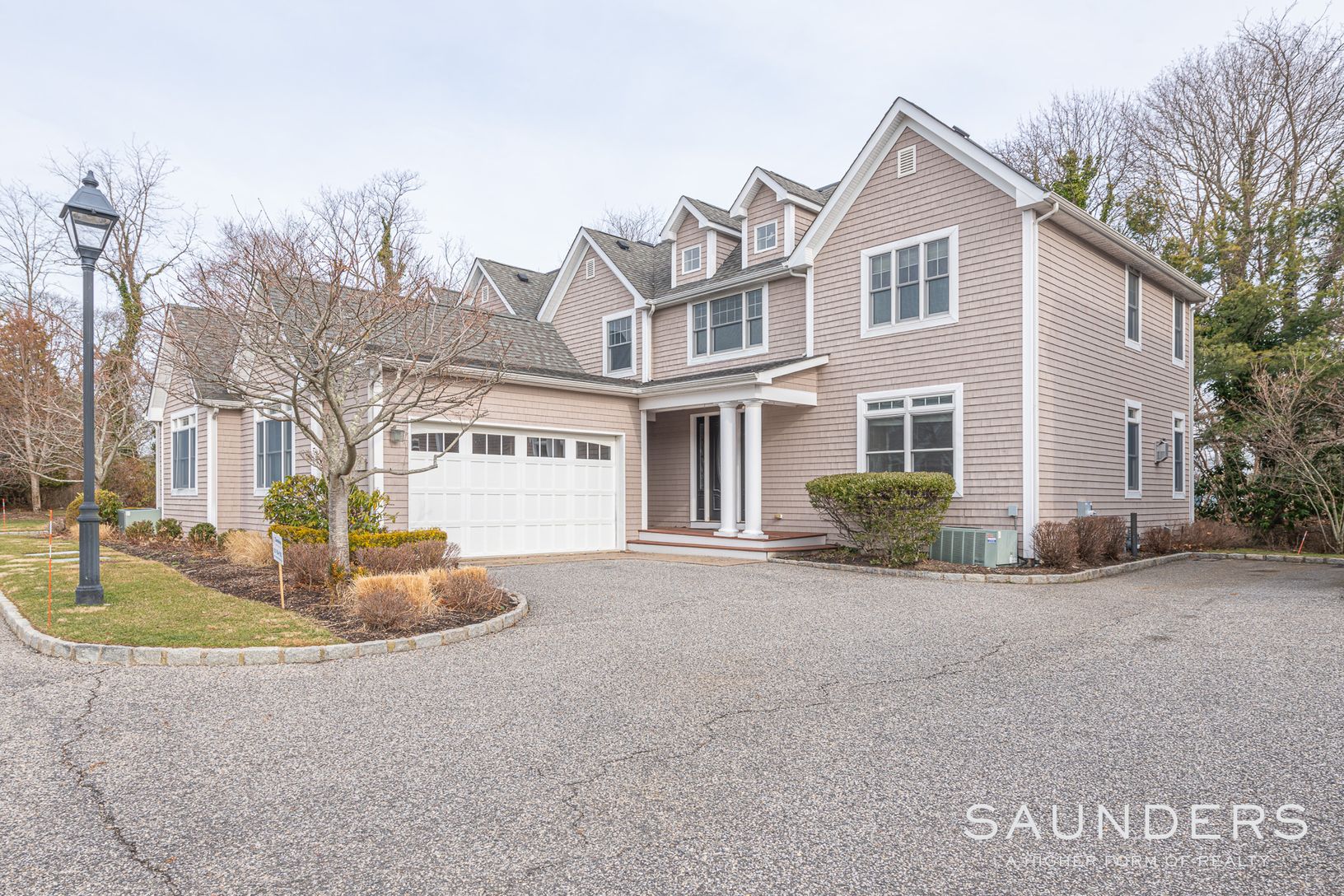  180 Main Street # 7 Westhampton Beach NY Large two story home with basement and large garage 