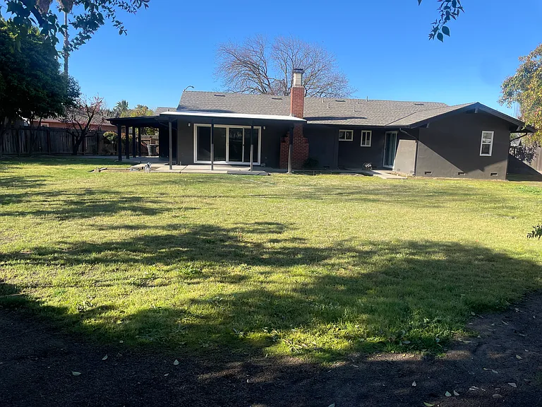 Backyard with covered patio
