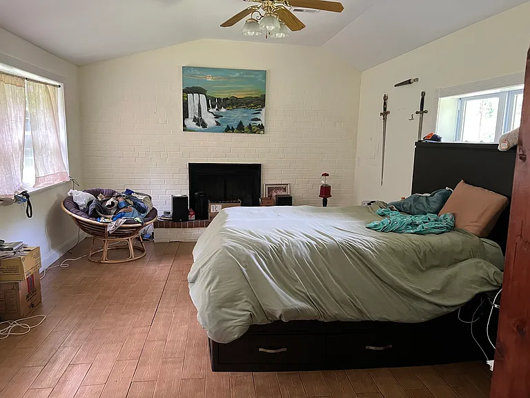 Master bedroom with furniture for scale.
