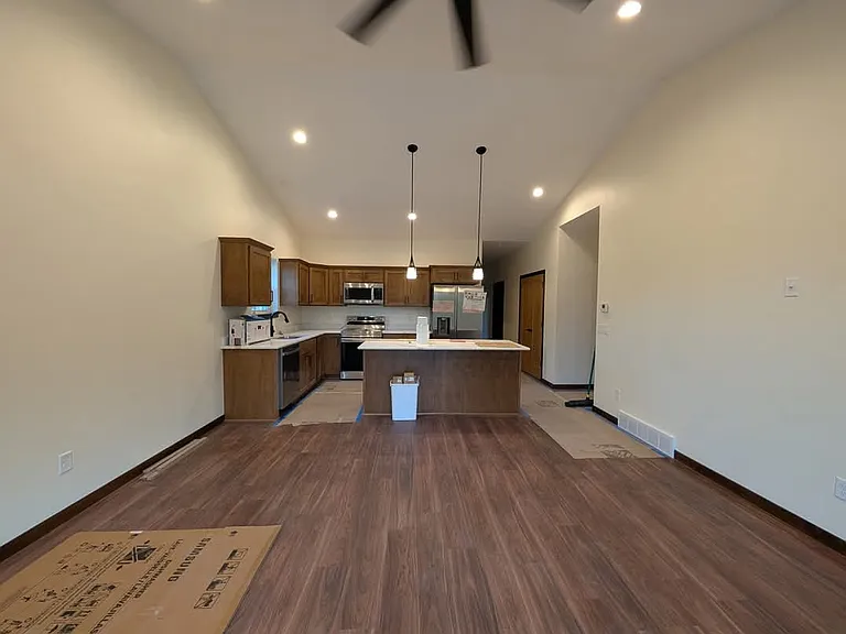 Open Kitchen with all appliances included, fridge, stove, microwave and dishwasher