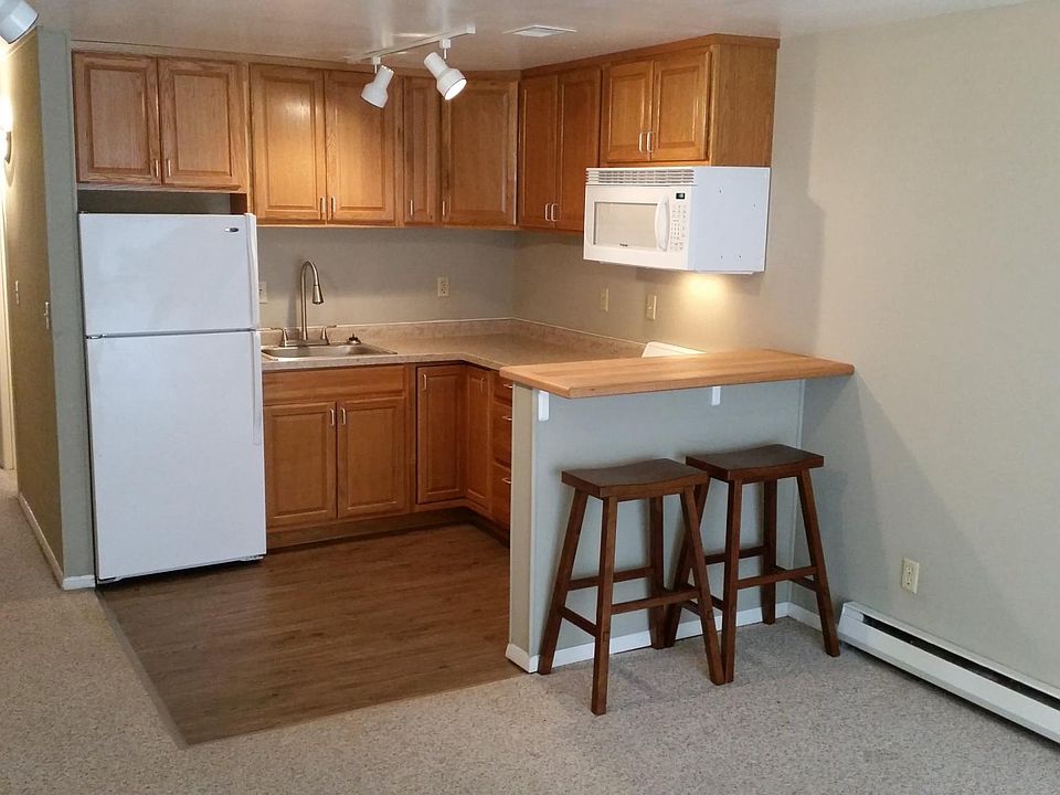 Kitchen and hallway into bedroom (kitchens may vary and not all have microwaves)