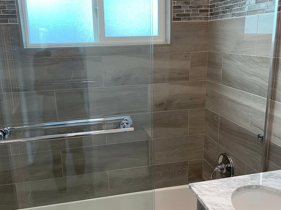 Italian tile Bath with glass enclosure