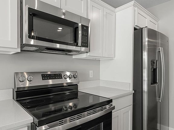 4th image of 1596 76th St W