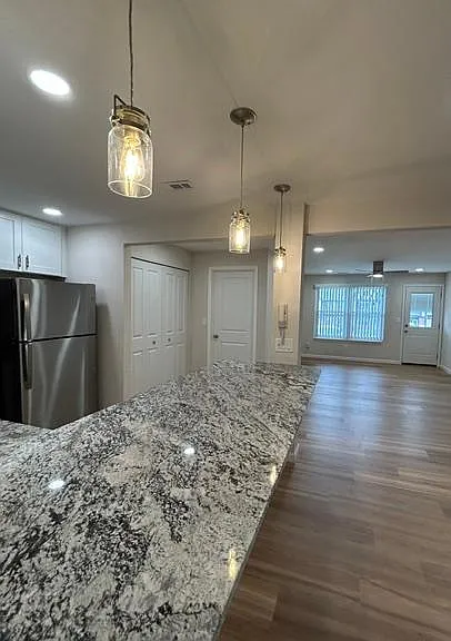 This condo has an 8 foot beautiful granite bar in the kitchen!