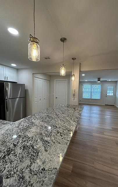 This condo has an 8 foot beautiful granite bar in the kitchen!