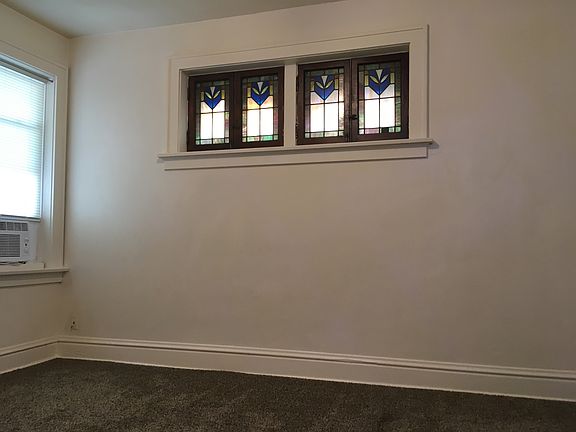 Master bedroom 13 x 12 features stained glass panels and a spacious closet
