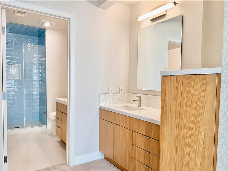 Primary bath with his and hers vanity