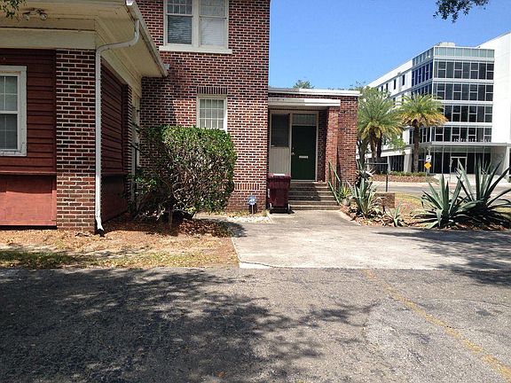 Back of house with parking
