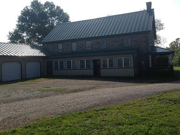 side view of house w/2 car garage