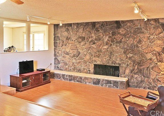 Track lighting, laminate wood flooring