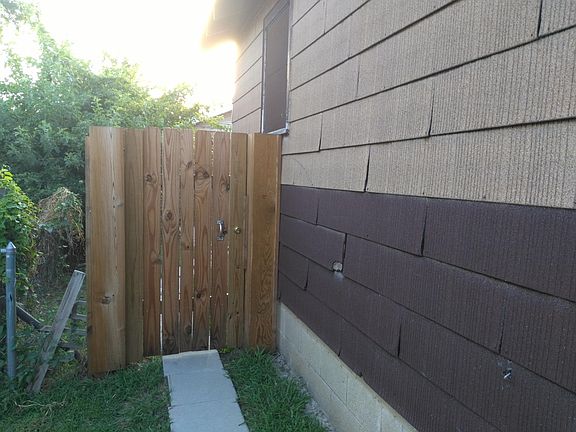 Keyed entrance to Apt. C's courtyard